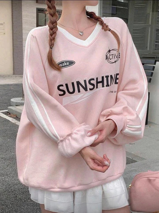 سويت شيرت نسائي وردي مطبوع - تصميم كاجوال