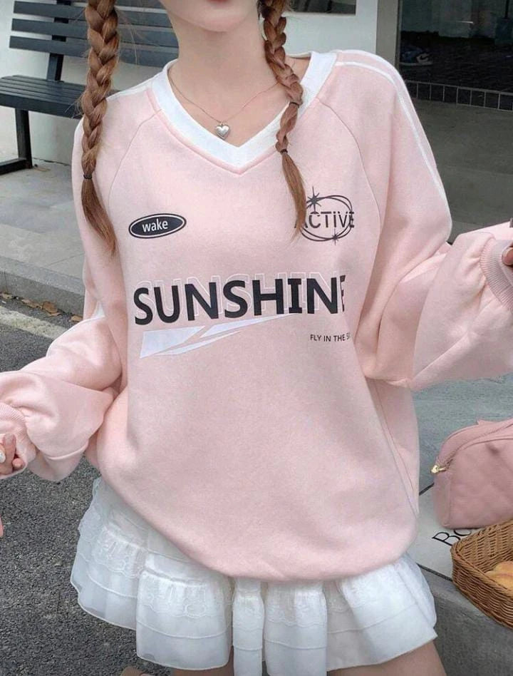 سويت شيرت نسائي وردي مطبوع - تصميم كاجوال