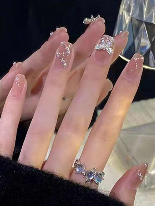 24 قطعة أظافر صناعية بقوس كريستالي نيود – تصميم راقٍ بلمسة لامعة وأحجار راين