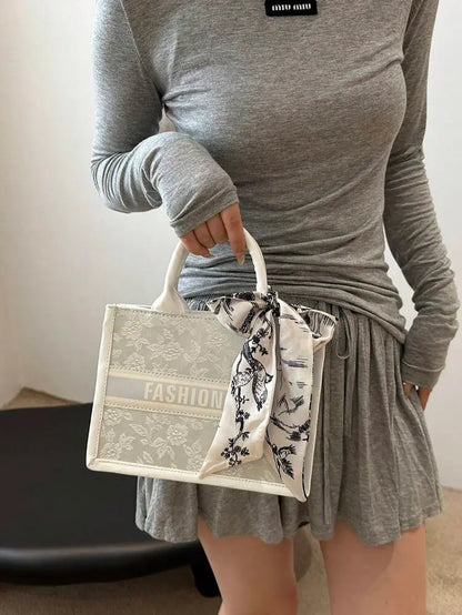 Elegant Structured Handbag with Printed Scarf Bow – Classic Chic Style | Delicado