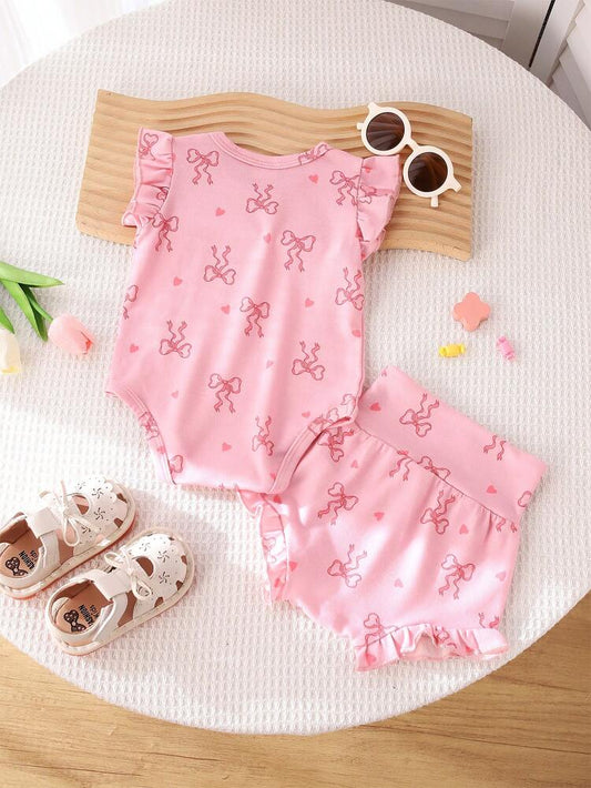 طقم بناتي قطعتين بطبعة فيونكة وردية – بدلة بأكمام مكشكشة وشورت بكشكشة