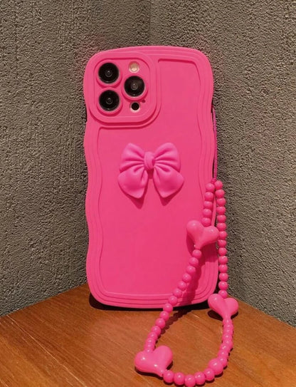 جراب هاتف من السيليكون بلون الفوشيا مزين بفيونكة ثلاثية الأبعاد وحزام مطرز بالخرز