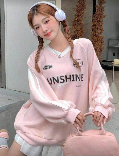 سويت شيرت نسائي وردي مطبوع - تصميم كاجوال